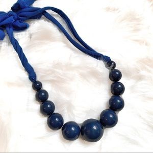 Navy tie boutique necklace